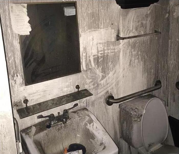 soot on bathroom walls