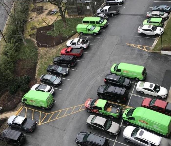 aerial view of green & other trucks