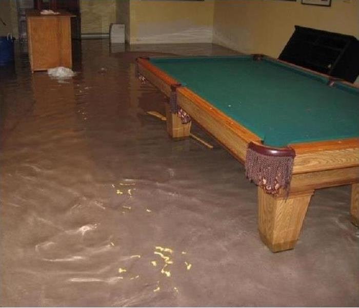 flooded basement with pool table