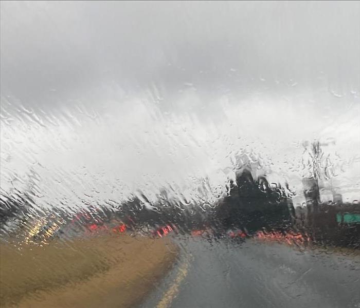Stormy, rainy thru car windshield